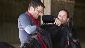 Pierre Forget and Michel Forget try to braid a horses main on Amazing Race Canada episode 7