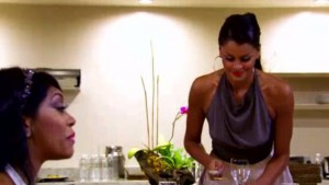 Claudia Jordan breaks a glass trying to get the ladies  attention on RHOA Drama Detox