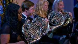 An orchestra plays in Hell's Kitchen and the chefs must prepare a lunch to be judged by the diners. Hell's Kitchen season 14