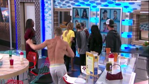 The houseguests study Liz's memory wall photo after learning she may have a twin playing #BB17
