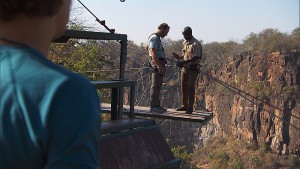 "King of the Jungle"--In this Road Block, Chris (center) must freefall over 200 feet into Batoka Gorge then swing over the rapids of the Zambezi River on THE AMAZING RACE, Friday, Oct. 23 (8:00-9:00 PM, ET/PT) on the CBS Television Network. Photo: CBS ÃÂ©2015 CBS Broadcasting, Inc. All Rights Reserved