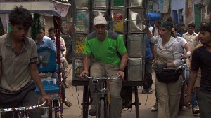 "It's Always the Quiet Ones"--In Detour A, Justin (left) and Diana (right) must load up a cargo rickshaw with 120 cans and deliver them to the New Taj Oil company in order to receive the next clue on THE AMAZING RACE, Friday, Nov. 20 (8:00-9:00 PM, ET/PT) on the CBS Television Network. Photo: CBS ÃÂ©2015 CBS Broadcasting, Inc. All Rights Reserved