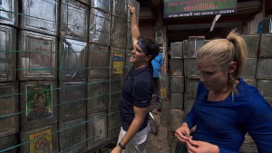 "It's Always the Quiet Ones"--In Detour A, Joey (left) and Kelsey (right) must load up a cargo rickshaw with 120 cans and deliver them to the New Taj Oil company in order to receive the next clue on THE AMAZING RACE, Friday, Nov. 20 (8:00-9:00 PM, ET/PT) on the CBS Television Network. Photo: CBS ÃÂ©2015 CBS Broadcasting, Inc. All Rights Reserved